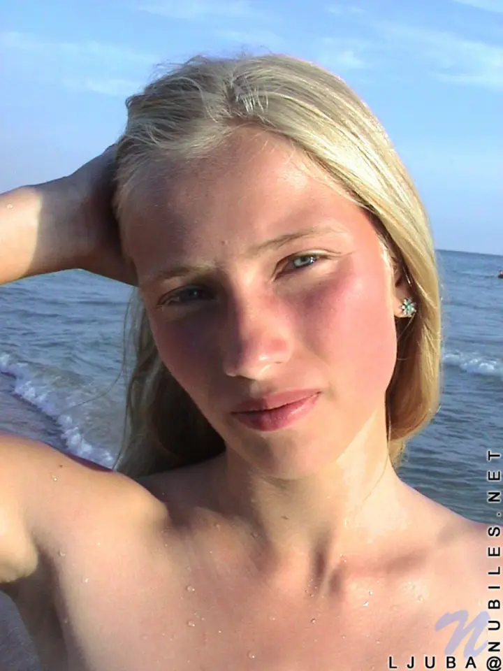 Ljuba's getting down to business at a nude beach, flaunting her modest bosom with perkily protruding nipples. — 13